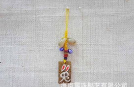 海南特色生肖椰雕手機掛飾廠家直銷批發(fā)